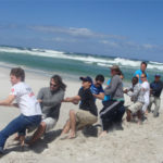 Team building on the beach at Monkey Valley Resort